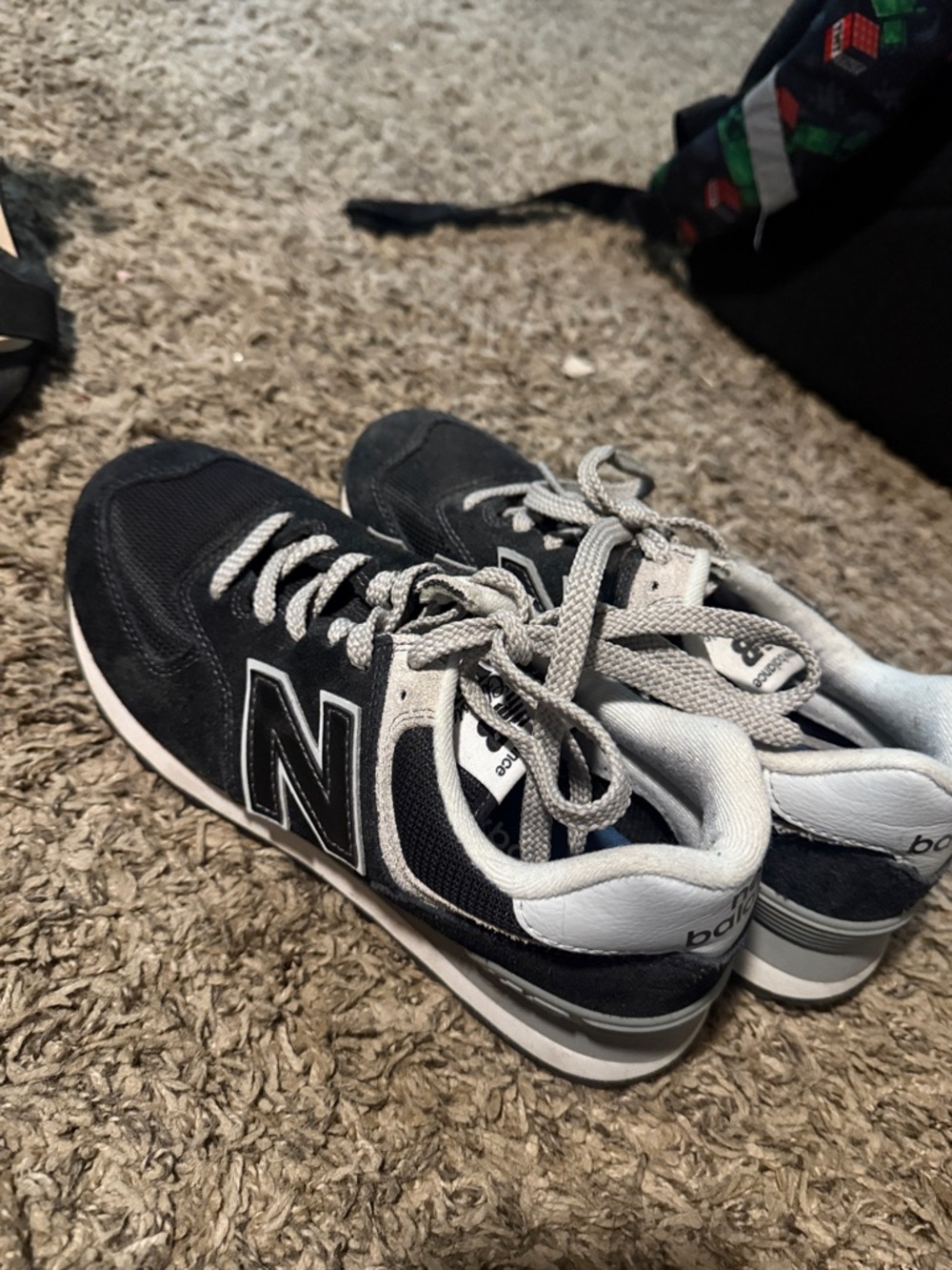 New Balance Black and White Lace-Up Sneakers